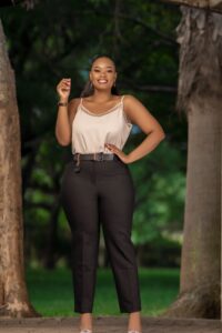 sleeveless top and tailored black trouser